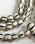 Tika Bracelet Carved Bone Mala- Light Striped