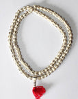 Tika Necklace Carved Bone Mala- Light Striped