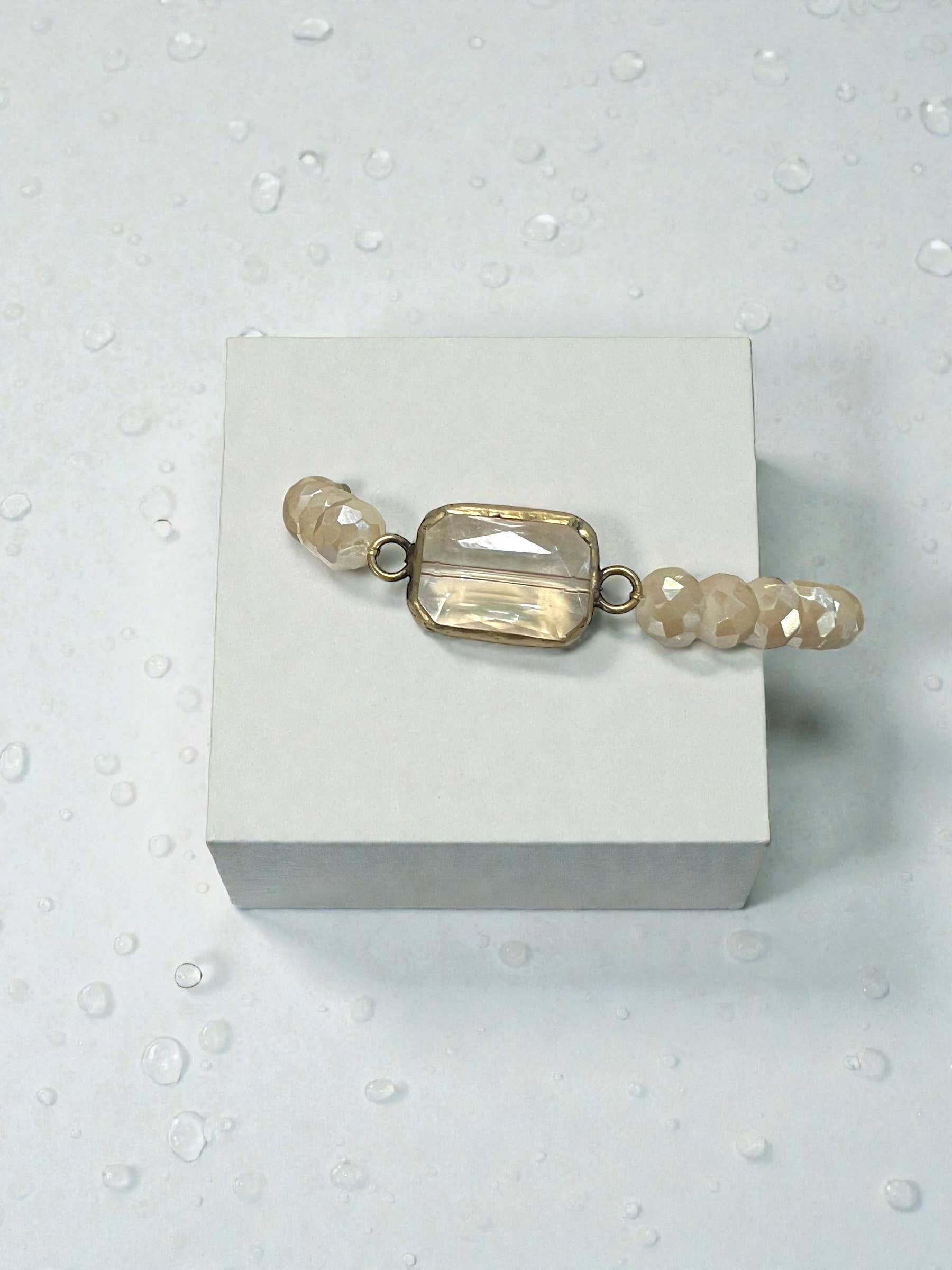 Ava Capri Bracelet Ava signature rectangle quartz accent ivory stretch bracelet